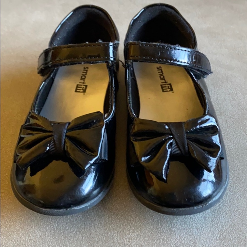 Black flats with a bow